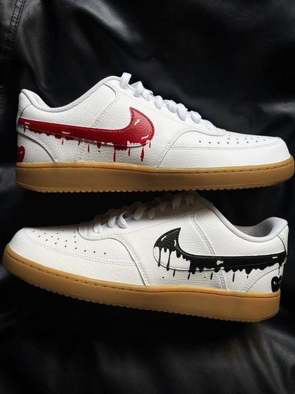 A top-down view of the drip hearts custom sneakers.