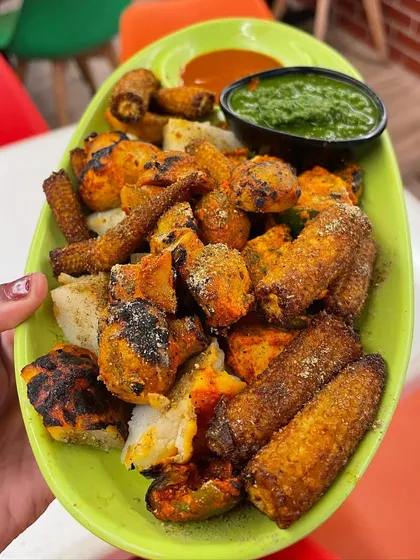 My All Mix Platter includes a variety of grilled items like potato, capsicum, paneer, mushroom, and baby corn.