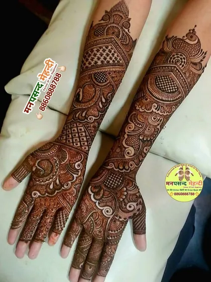 A full-arm Arabic design with flowing, interconnected patterns. This style is known for its elegance and is perfect for someone who wants a design that is both full and not overly dense.
