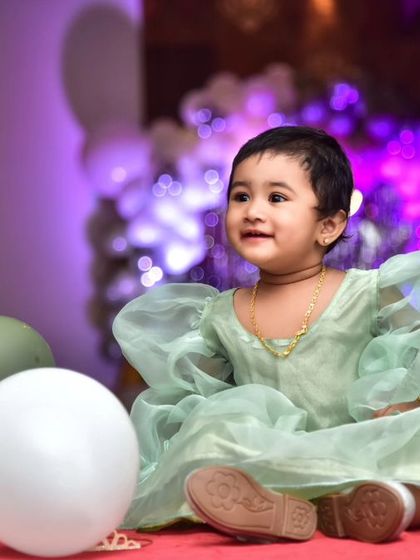 A charming 'Farm' themed birthday party, with rustic decor, animal cutouts, and hay bale props, perfect for a country-style celebration.