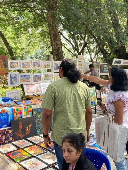 The bustling atmosphere of the art fair.