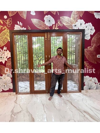For this residence, I covered the main wall in a bold floral pattern using white paint and gold foil against a rich maroon background. The contrast is dramatic and gives the entire room a feeling of opulence.