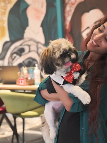 A dapper doggo in a bow tie getting all the love. Our cafe is a place for creating picture-perfect memories.
