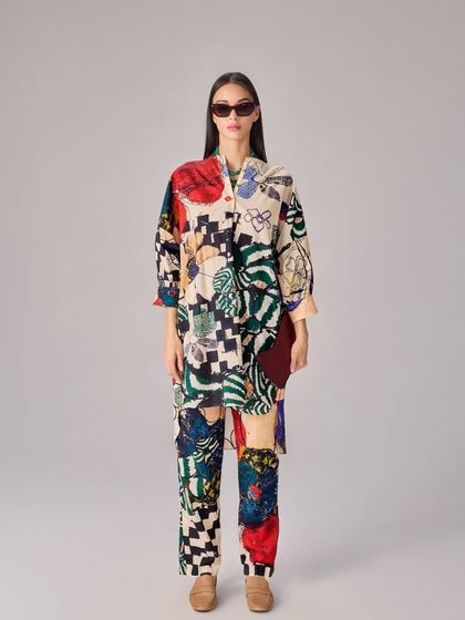 A full look of the oversized printed shirt and matching trousers, a bold and artistic co-ord set.