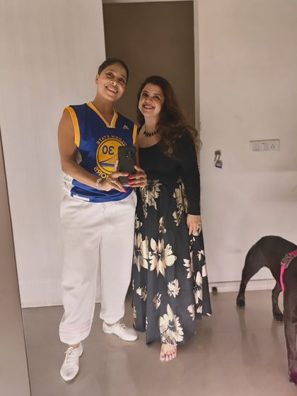 A student posing with a guest at our Halloween party. Our socials are always a welcoming space for everyone.