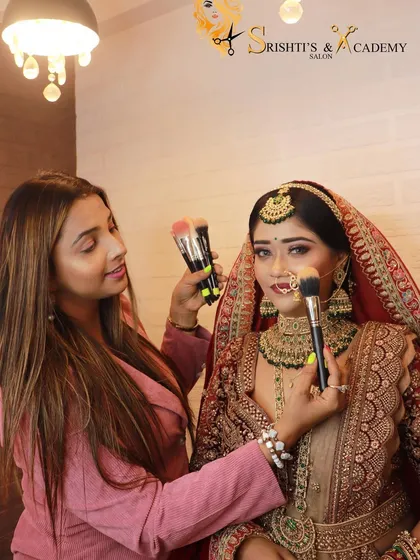 An instructor giving the final touches to a bridal look. This image captures the personal attention and expertise we bring to every makeover and class.
