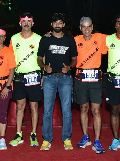With a group of runners on World Tourism Day. I organize runs for various occasions, bringing people together to celebrate and stay fit.