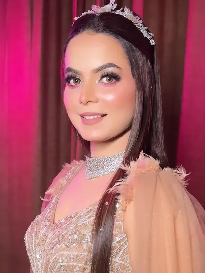 A close-up of the finished engagement makeup. Notice the soft, blended eyeshadow, the perfect skin glow, and the elegant diamond jewelry that completes this modern princess look.