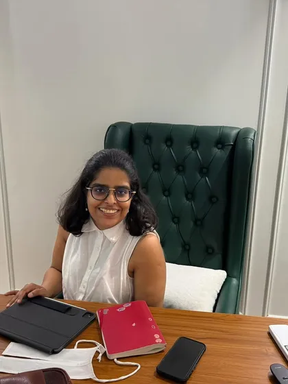 A candid moment at my desk, where I spend countless hours drafting contracts and strategizing for my clients. This is where the hard work happens to protect your creative vision.