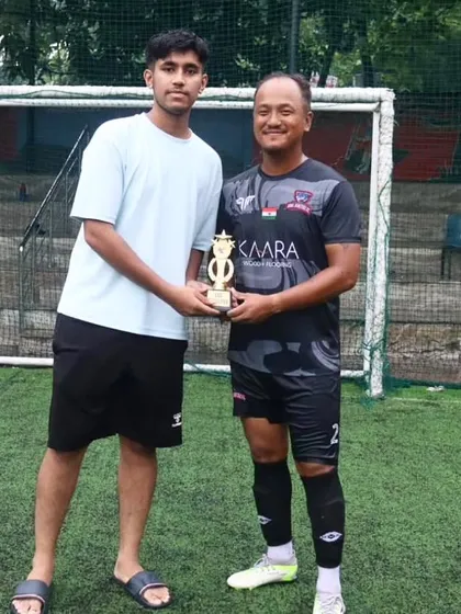 Our goalkeeper receiving the Best Goalkeeper award at the Clash of Champions.