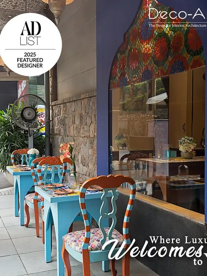 The outdoor seating at Nooshe Joon, where luxury welcomes you. We used vibrant, hand-painted furniture and colorful stained glass to create a cheerful and artistic dining atmosphere.