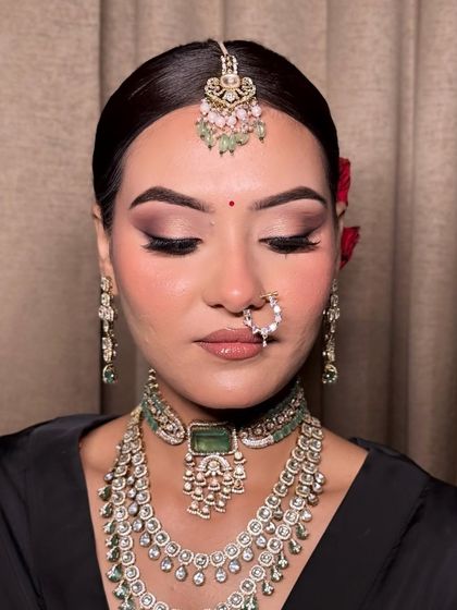 Another angle of this stunning bridal makeup. The focus is on the beautifully blended eye makeup and the smooth, airbrushed skin finish that will last throughout the wedding ceremonies.