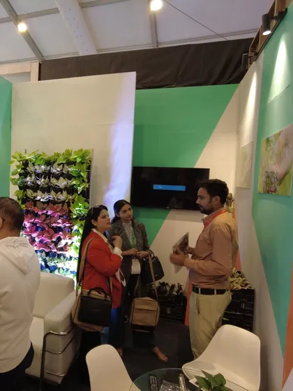 Our team members in discussion with potential clients at our FOAID stall. We are proud to offer transformative green solutions and enjoy sharing our expertise with the design community.