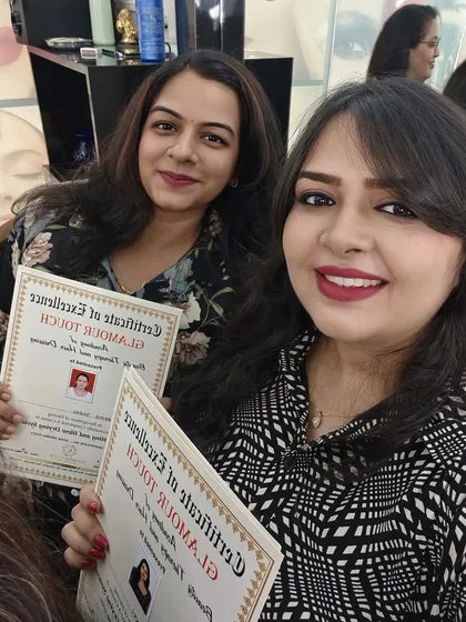 Two of my students proudly showing their Certificates of Excellence. This is the reward for all their hard work and practice.