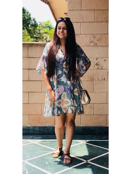 A floral wrap dress with bell sleeves is a soft and feminine choice for a daytime event or a brunch. The silhouette is universally flattering, and the print is perfect for summer.