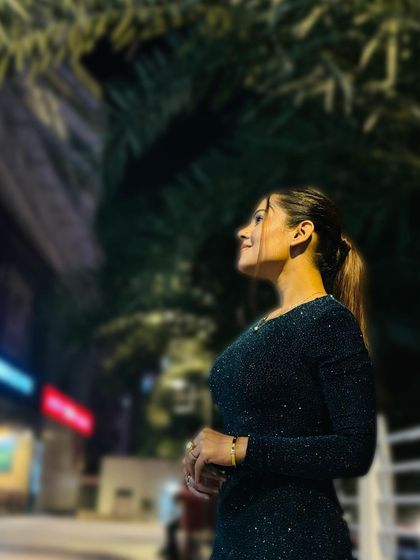 An atmospheric shot showing how the makeup looks elegant even in low, ambient lighting.