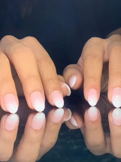 A simple and elegant baby boomer ombre on shorter, natural-looking nails.