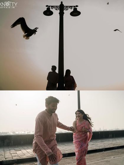 A silhouette against the evening sky at the Mumbai waterfront. The lamppost creates a strong graphic element, and the bird in flight adds a touch of serendipity to this romantic pre-wedding photo.