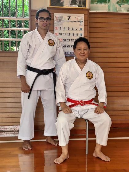 A senior student from our dojo with Hanshi Minoru Nakazato. This direct mentorship is a key part of our advanced training.