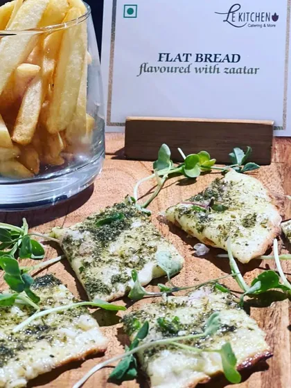 Za'atar-flavored flatbread served with a side of classic French fries, a simple yet delicious offering from our Femina Miss India event menu.
