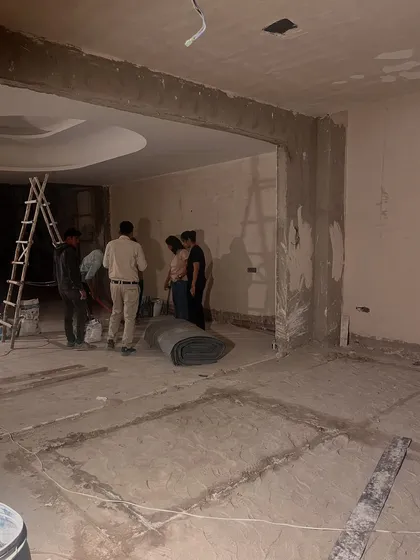 Our team on-site during the marble flooring installation. We conduct these visits to verify material quality, check measurements, and ensure the layout and installation meet our exacting standards for precision and accuracy.