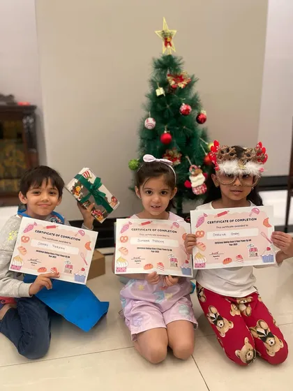 Every little chef deserves to be celebrated. At the end of our Christmas workshop, everyone gets a certificate of completion to recognize their amazing baking skills.