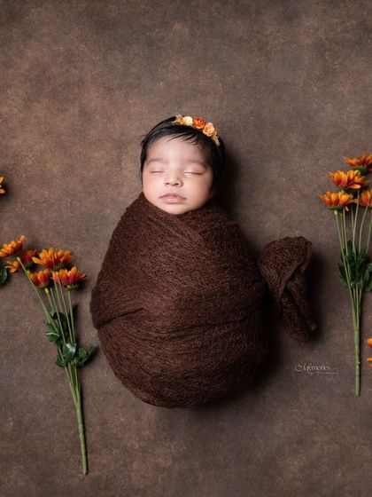 I love when parents want to move beyond pink and blue. This shoot used beautiful, earthy brown tones for a unique and timeless newborn portrait.