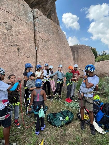 Anupa and Adya with a group of young climbers. We are passionate about introducing the next generation to the sport in a safe and encouraging way.