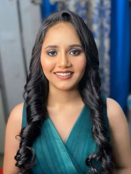 A bright, happy smile from this client, ready for her event. The makeup is glamorous yet feels light and comfortable.