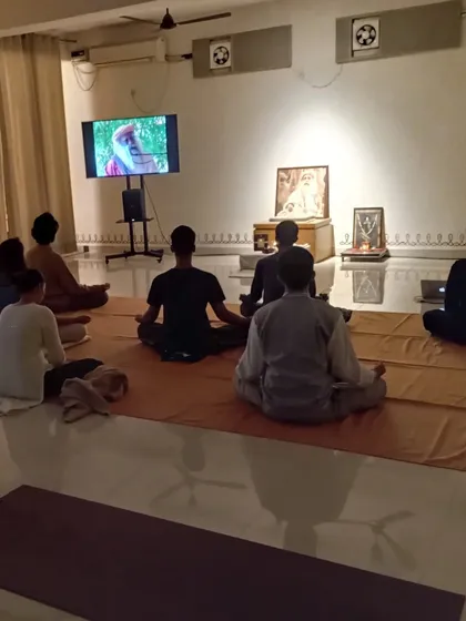 We often participate in live-streamed events with Sadhguru. Here, our community gathers to watch a satsang, connecting with the Guru and the larger global community.