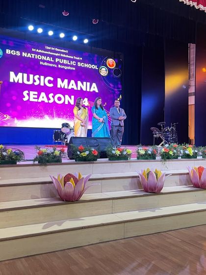 The organizers and judges on stage at the BGS National Public School's music competition.