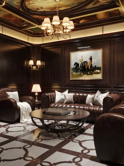 A different angle of the classic lounge, focusing on the seating arrangement around the coffee table. This view emphasizes the rich textures of the leather sofas and the intricate pattern of the inlaid flooring.