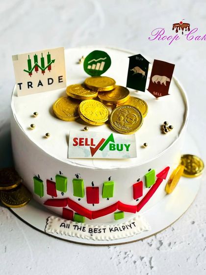 A cake for a stock market enthusiast. This design features candlestick charts, bull and bear icons, and edible gold coins, making it a great way to wish someone "All the Best" in their trading journey.