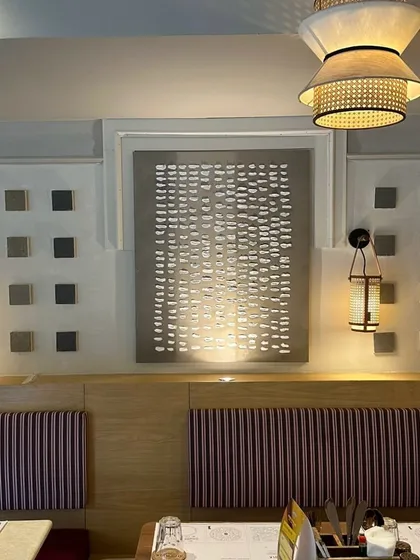 Another piece from the Agra installation, this one featuring a pattern of raised white dashes on a neutral background.