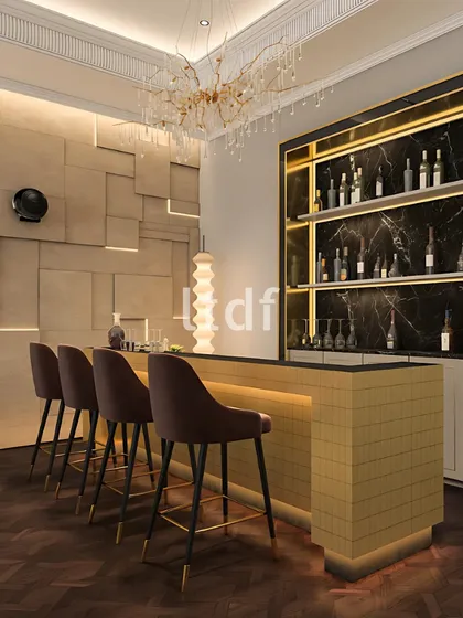 This bar area is designed to elevate the experience of entertaining at home. We curated a composition of rich textures, moody lighting, and a touch of golden glamour to create a setting that invites conversation, comfort, and sophisticated indulgence.