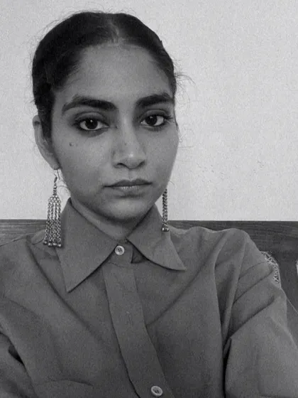 A black and white portrait of artist Avnit Singh, whose open studio offered a space for solace and reflection through her watercolour series.