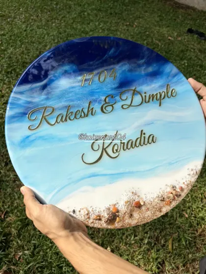 Another shot of this beautiful, handcrafted ocean nameplate. The glossy finish reflects the light beautifully, just like water. It's a perfect way to welcome guests to your home.