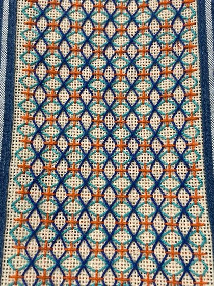 A phone insert with a striking pattern in blue, green, and orange. Each one is a small canvas for creativity.