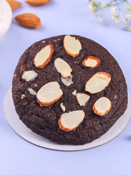 The Almond Brownie Crinkle cookie is a unique treat. It has the rich flavour of a brownie with the chewy texture of a cookie, topped with sliced almonds.