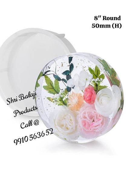 An 8-inch round silicone mold, perfect for creating large resin paperweights or decorative spheres with floral inclusions.
