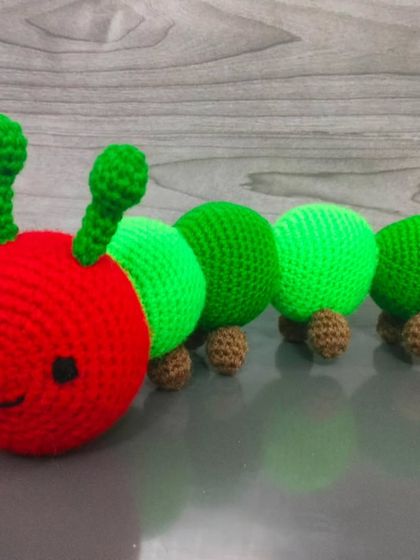 A side view of my handmade caterpillar toy.