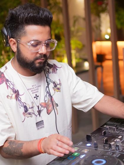 A profile shot of me mixing at Perissa, showing the concentration it takes to build a great set.