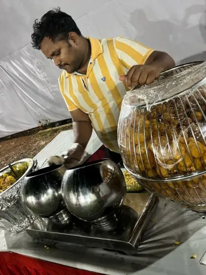 A live pani puri counter is always a hit. Here, my staff is serving freshly made pani puri to guests at a 58th birthday party in Vashi.