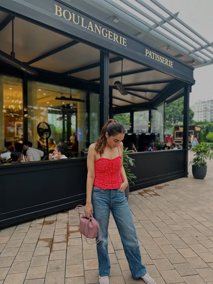 Another take on the red top and jeans combo. It’s all about finding your favorite pieces and wearing them with confidence.