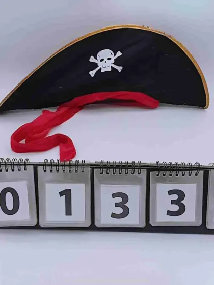 Every little captain needs a proper pirate hat. This classic black tricorne hat features the iconic skull and crossbones emblem and a red ribbon tie to complete the swashbuckling look.