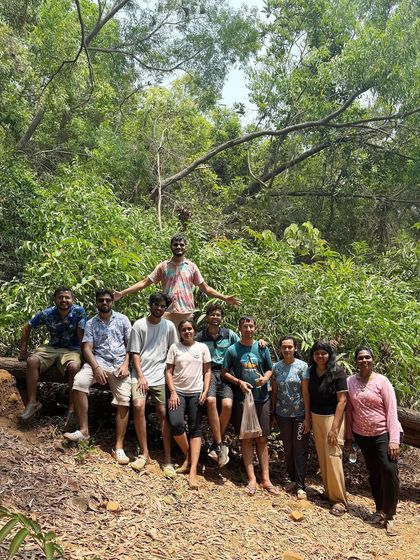 A group photo on the trail during our Gokarna beach trek, surrounded by lush greenery.