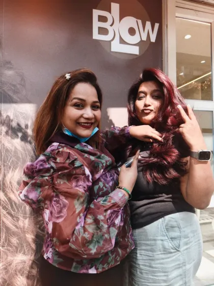 Having some fun with a client after her color session. We believe getting your hair done should be a joyful experience.