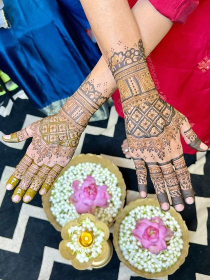 A different style for the bride's mom, this one featuring a classic check pattern on the back of the hand.