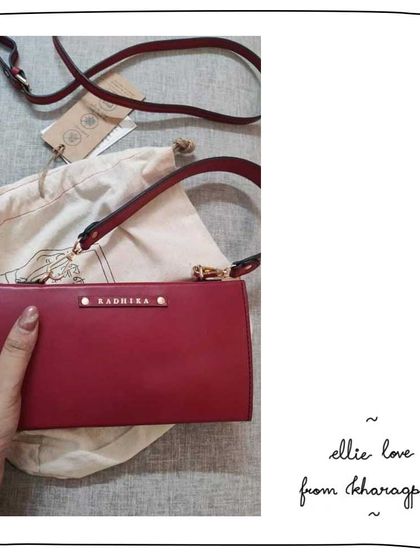 Radhika from Kharagpur with her new Ellie wallet in Cranberry. She customized it with an added shoulder handle and a monogram.
