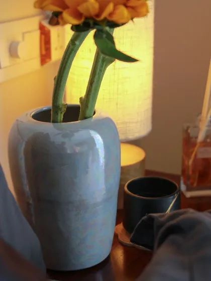 A beautiful pearlescent vase from the 'Celebrations' collection, adding a touch of refined style to any space.